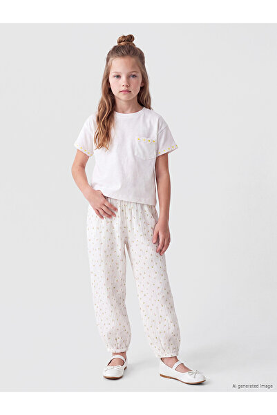 LC Waikiki Nevavm Farkıyla Lcw Kids Ecru Printed Balloon Fit Elastic Leg Girl...