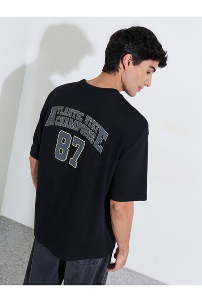 Styli Black Graphic Print Crew Neck Oversized T-Shirt