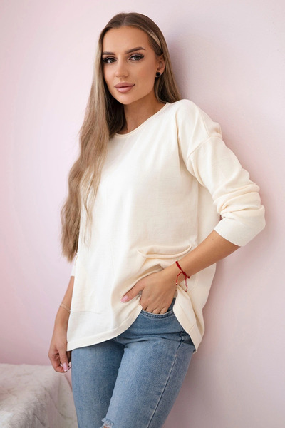Kesi Pulover ecru cu buzunare frontale, moale și elegant, pentru ținute casual.