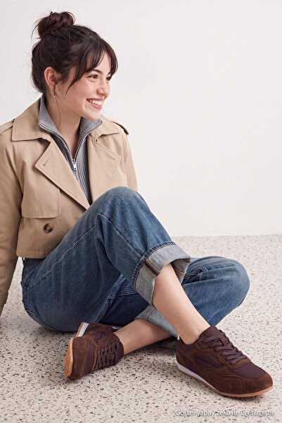 TRENDYOL SHOES حذاء رياضي نسائي ريترو باللون البني الداكن TAKAW27SN00004