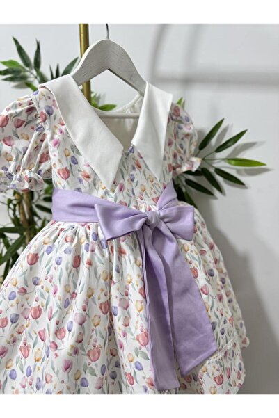 sunshine boutique15 فستان التوليب بتصميم مميز - 2/1 سنه الطول 46 سم الوسط 56 سم