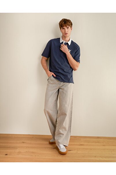 AMERICAN EAGLE قميص بولو بتصميم جرافيك من AE Standard Fit