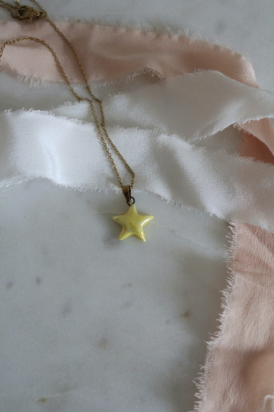 sukupotCeramics Pearlescent Yellow Star Porcelain Tip Steel Necklace