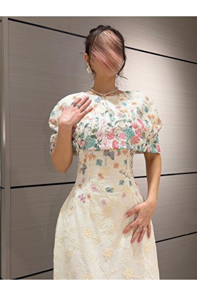 NAQWA FASHION فستان سهرة أنيق بطبعة فراشات بتصميم أنثوي