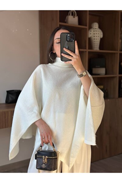 Tuğçe Özer ASİMETRİK KESİM PANÇO