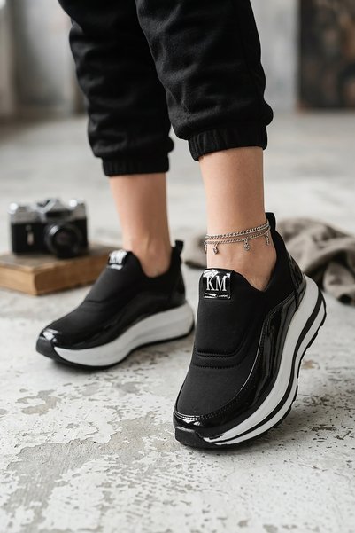 Modaarmada Siyah beyaz esnek taban bağcıksız kadın sneakers