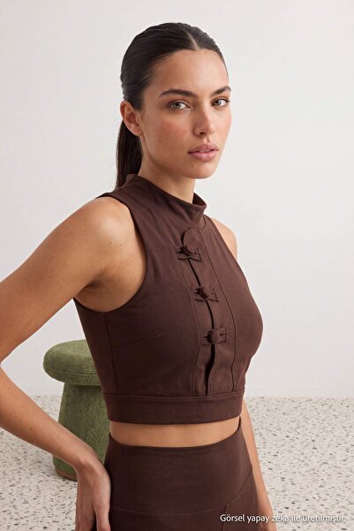 Trendyol Collection حمالة صدر رياضية محبوكة من القماش الناعم باللون البني مع ...