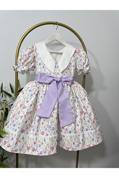 sunshine boutique15 فستان التوليب بتصميم مميز - 2/1 سنه الطول 46 سم الوسط 56 سم