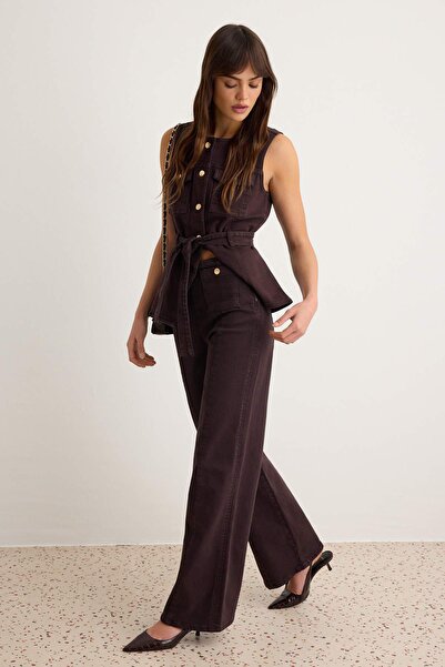 Trendyol Collection بنطلون جينز واسع الساق بخصر مرتفع متوسط المرونة ومزين بأز...