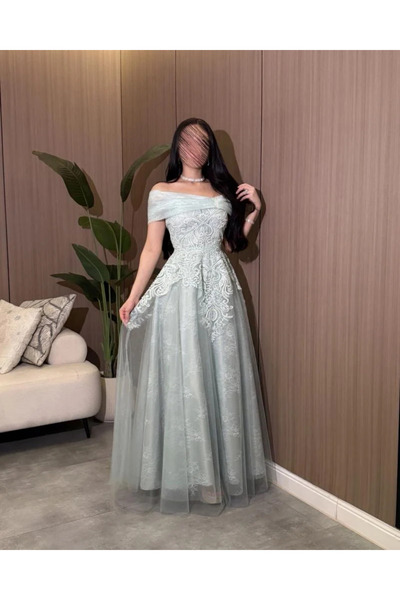 NAQWA FASHION فستان سهرة مميز باللون التيفاني