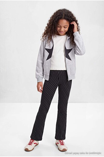 TRENDYOLKIDS Schwarze, elastische, gerippte, gepunktete Strickhose für Mädche...