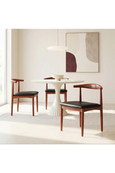 Vi Markets An elegant dining chair featuring a warm wood frame, curved backre...