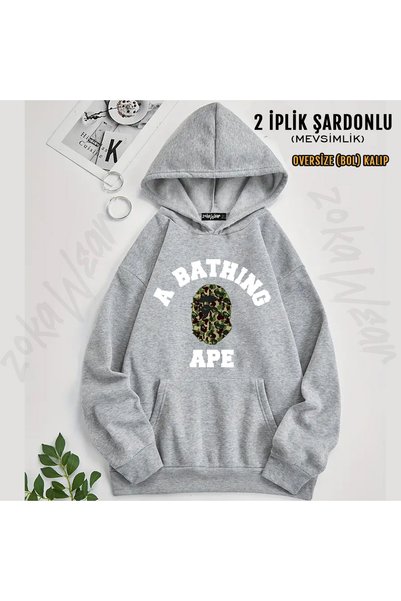 ZOKAWEAR سترة بقلنسوة مطبوعة بنمط التمويه من Bathing Bape