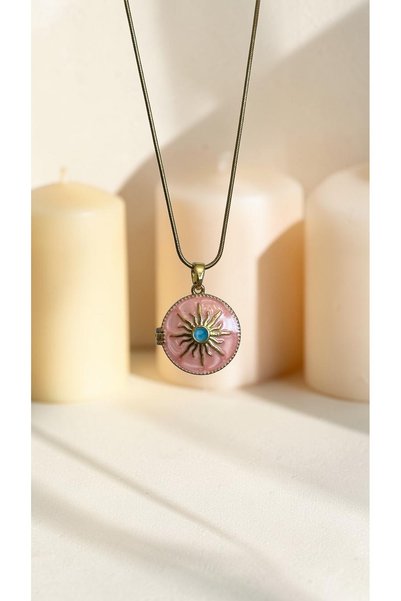 Dore Collection Oval Medallion Steel Necklace with Embossed Sun Figure and St...