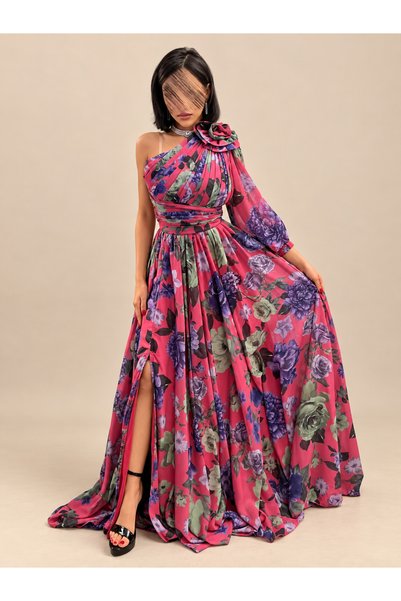 Rose Luxurious Evening Gown with a Feminine Silhouette, Featuring a Vibrant Fuchsia and Large Pink Pattern with Shades of Purple, Mauve, and a Calm Green. Features a One-Shoulder Cutout with a Prominent Fabric Rose,