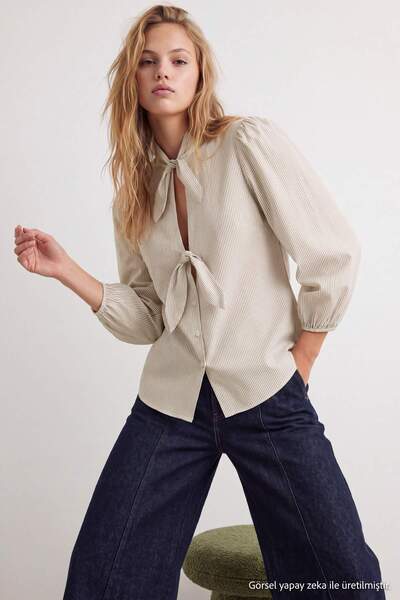 Trendyol Collection Bluză bej cu dungi și legătură în față TWOAW27BZ00341