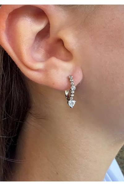 XUPING JEWELRY أقراط KALPP من الفولاذ باللون الفضي مع أحجار الزركون