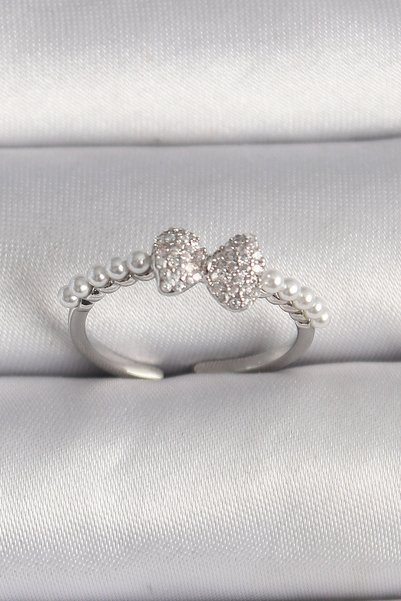 Eldenör Silver-Toned Rice-Shaped Ring with Zircon Stones, Bow Detail, and Pea...