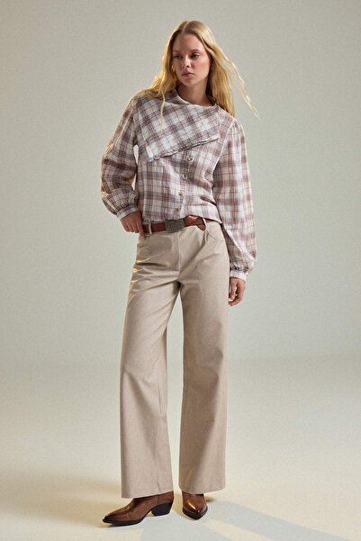 Trendyol Kollektion Beigefarbene Kunstlederhose TWOAW27PL00113