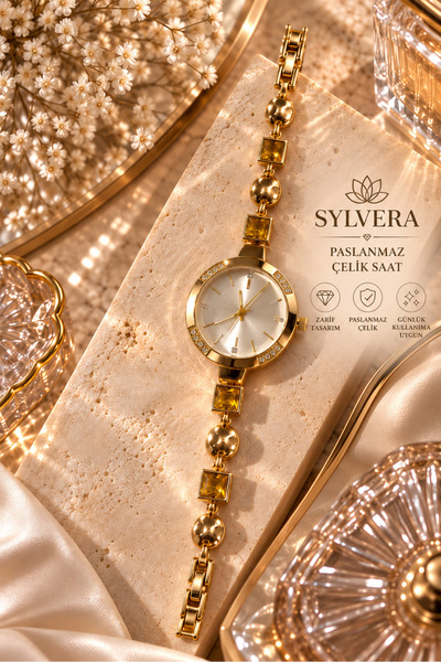 Sylvera Shop ساعة يد فولاذية بتصميم دائري ومينا أبيض وتفاصيل حجرية مربعة صفرا...