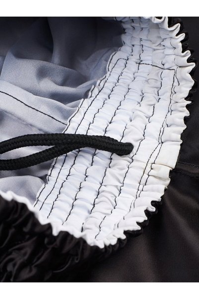 Mantovani MANTO pantaloni scurți MUAY THAI DUAL negru/argintiu mărime XXL
