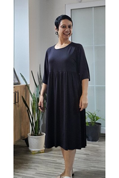 Mertcan Butik Черна рокля с тричетвърти ръкави, с набрана предна и задна част...