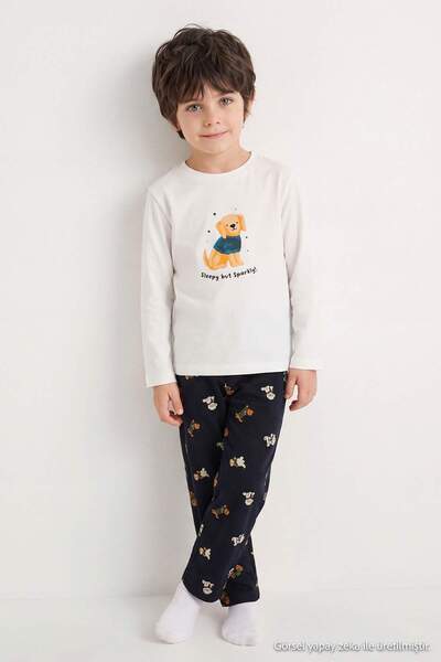 TRENDYOLKIDS Pamučni pidžama set za devojčice/dječake u boji krem TKDAW27PT00042