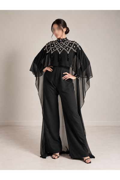Thnyiah Black jumpsuit with embroidery