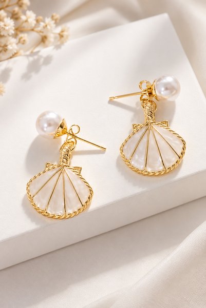 THE Steel White Sea Shell Figured Gold Dangle Earrings