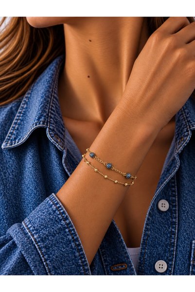 Sacha Accessories سوار ذهبي مزدوج الصفوف بتصميم تميمة العين الشريرة