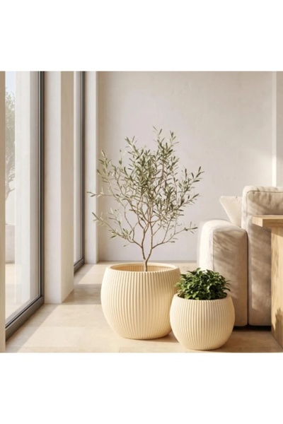 Vi Markets Elegant decorative planters featuring a stylish ribbed texture and...
