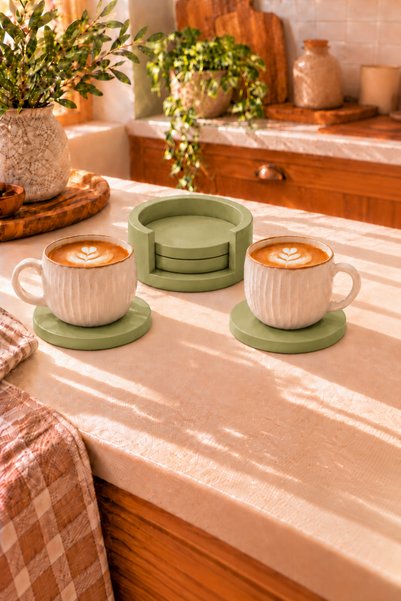 Zigzag Home طقم قواعد أكواب من الخرسانة المزخرفة باللون الأخضر مكون من 4 قطع مع حامل على الطراز البوهيمي