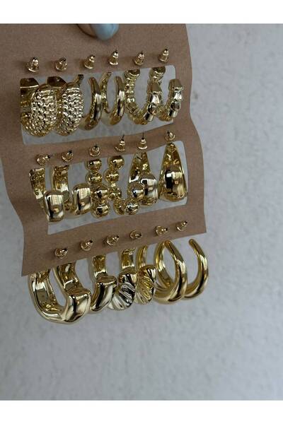 the matdesign Gold Color 9-Piece Multi Hoop Earring Set, Volume Earring Set with Plain, Textured, Twisted and Ball Detail