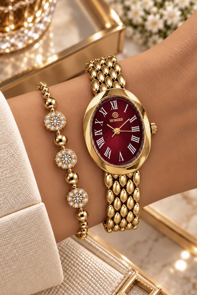 Homies ساعة يد نسائية بعلبة بيضاوية ذهبية اللون - سوار فولاذي مقاوم للماء 3AT...