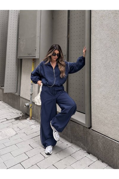 SUYA US WEAR طقم نسائي مكون من سترة قصيرة بسحّاب واسعة الحجم من قماش الباراشوت وبنطلون واسع الساقين