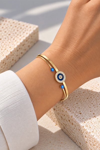nftart.design Gold Steel Handcuff Bracelet with Evil Eye Beads and Stone Deta...