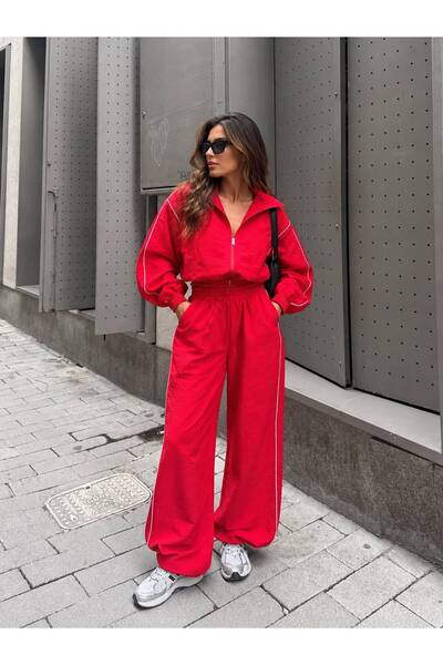 SUYA US WEAR طقم نسائي مكون من سترة قصيرة بسحّاب واسعة الحجم من قماش الباراشوت وبنطلون واسع الساقين
