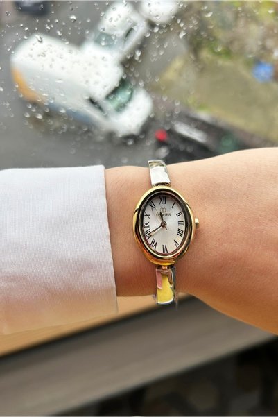 Homies Women's oval case white dial gold color steel strap wristwatch gift