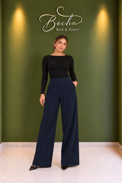Becha Butik بنطلون قماش واسع الساق بدون أزرار من سيمالي