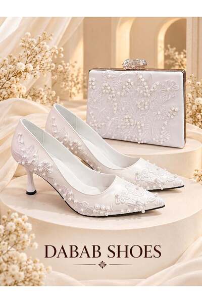 dabab shoes حذاء نسائي من VIANEL مزين بالزهور البيضاء واللؤلؤ مع كعب عالٍ 7 س...