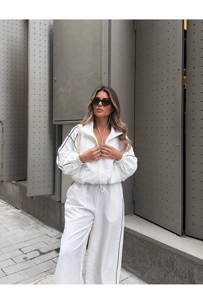 SUYA US WEAR طقم نسائي مكون من سترة قصيرة بسحّاب واسعة الحجم من قماش الباراشوت وبنطلون واسع الساقين