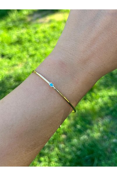 nunu takı Delicate Gold Cuff with Blue Stone Charm