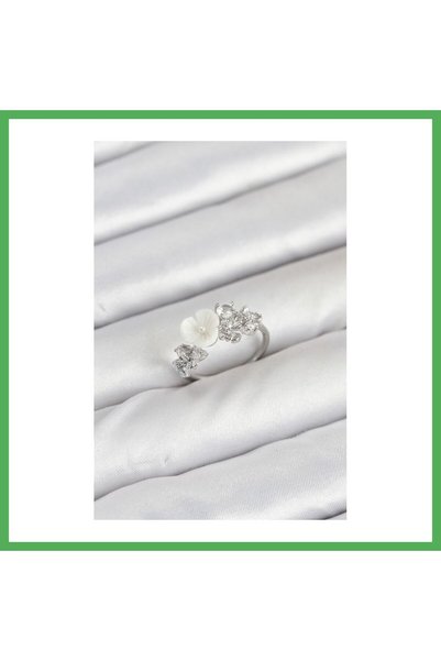 Nur store Çanta خاتم نسائي من النحاس الفضي اللون بتصميم زهرة مرصع بحجر الزركو...