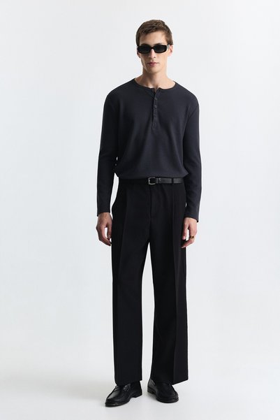 Antioch Loose Fit Pleated Trousers
