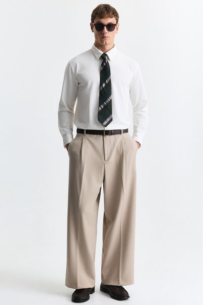 Antioch Loose Fit Pleated Trousers