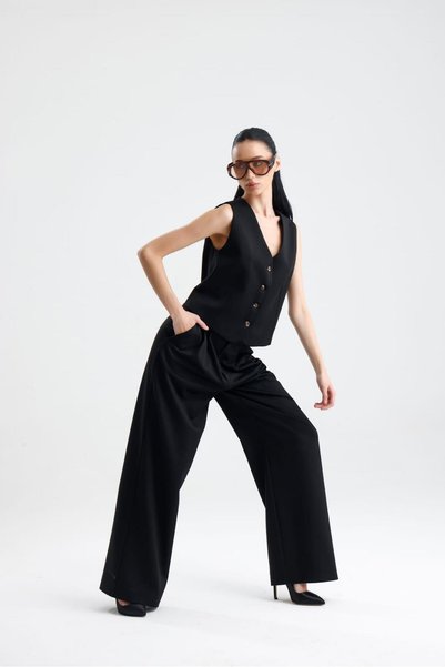 GACA COLLECTION SPELLO Pantaloni clasici de damă, plisați în față, din țesătu...
