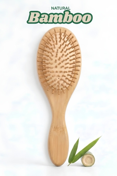 Natural'iz Beauty فرشاة شعر بيضاوية الشكل مصنوعة من الخيزران الطبيعي 100%.