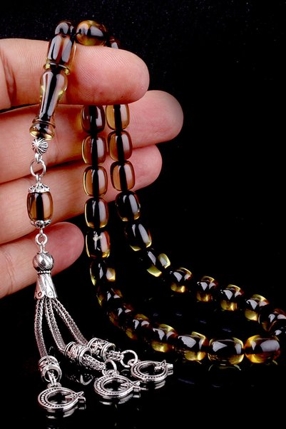 Silvano Jewelry مسبحة بتصميم نجمة وهلال مزينة بشرابات، بلون بني عسلي.