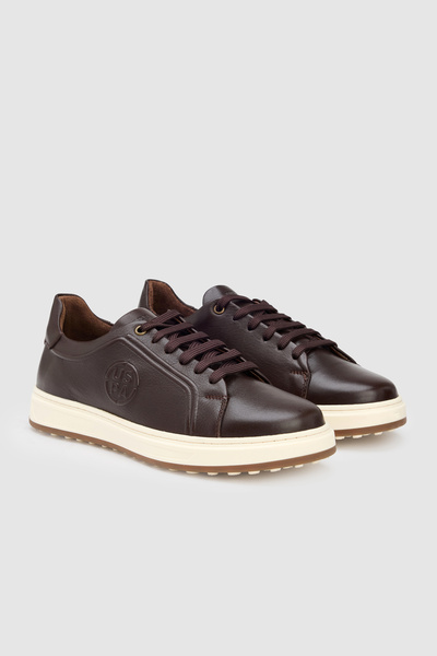 U.S. Polo Assn. حذاء رياضي رجالي باللون البني مع أربطة ونعل أبيض، موديل 50330...