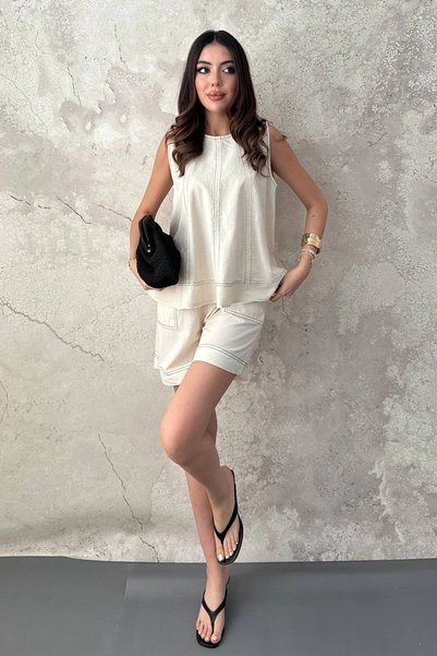 bysocafashion طقم نسائي من القطن البيج، مزين بتفاصيل مطرزة.